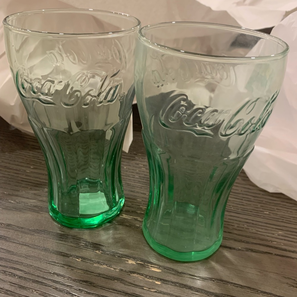 Two vintage Coca Cola cups